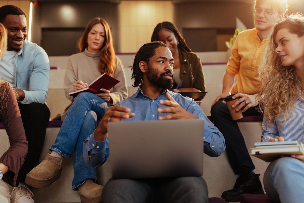 a group of people studying with their instructor
