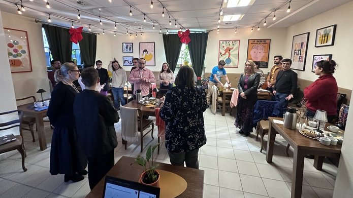 the photo shows the participants of the meeting at Wspólnia at the UniLodz Rector's Office building