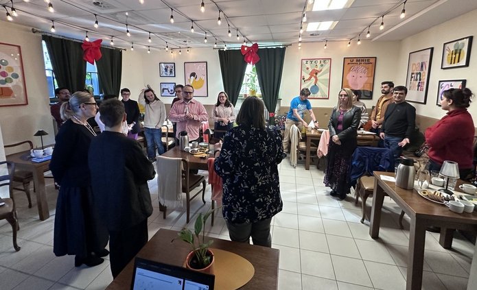 the photo shows the participants of the meeting at Wspólnia at the UniLodz Rector's Office building