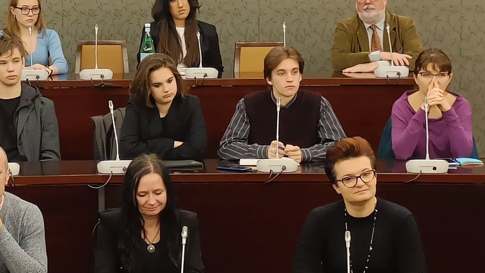 Participants and mentors of the "Talented at School, Brilliant at the University" programme sitting at the assembly hall during the inauguration