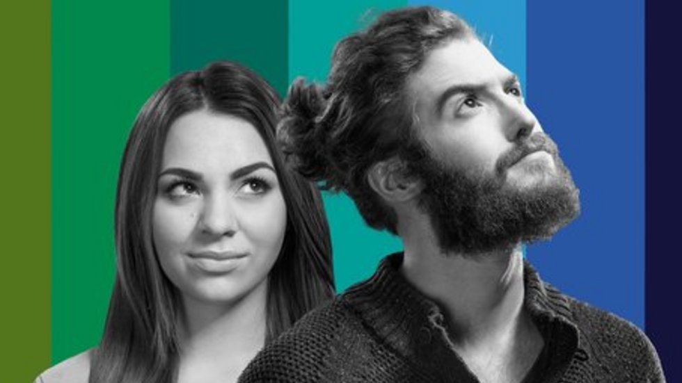 Students - a girl and a boy against the background of colourful stripes